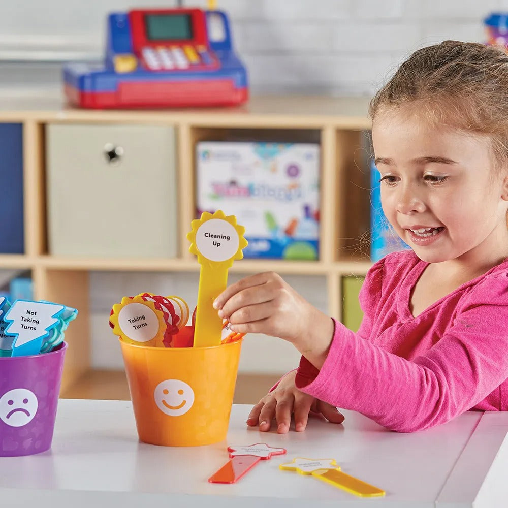 Good Behaviour Buckets, Level up your classroom management with our innovative Good Behaviour Buckets! This early childhood behaviour tracker offers teachers and children an engaging, visual way to monitor behaviour and encourage emotional development. Good Behaviour Buckets Features: Preprinted Emotions and Behaviour Stickers: The kit comes with 30 preprinted stickers that represent basic emotions and behaviours. These stickers can be easily applied to the coloured sticks, making it effortless to track var