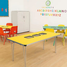Yellow Gopak Tub Table with four tubs in an early years classroom