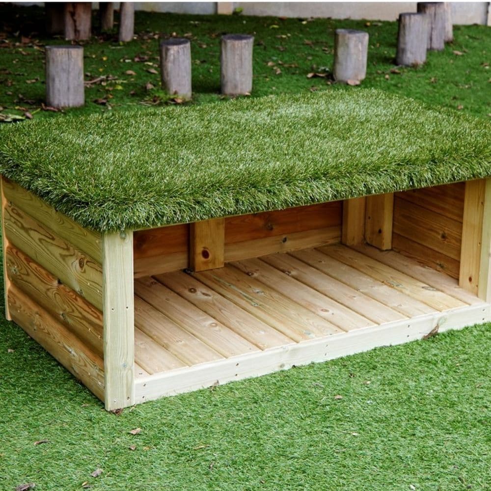 Grass Topped Bench with Storage, Complete your outdoor area with our Grass Topped Bench with Storage! This Grass Topped Bench with Storage has been designed to encourage group activities as children can sit, talk and play - enhancing their social and team-building skills. The artificial grass top can also be used as a base for small world animal play. The handy storage compartment underneath can be used to store a variety of items from messy play utensils to wellies. Made from FSC Scandinavian Redwood Deliv