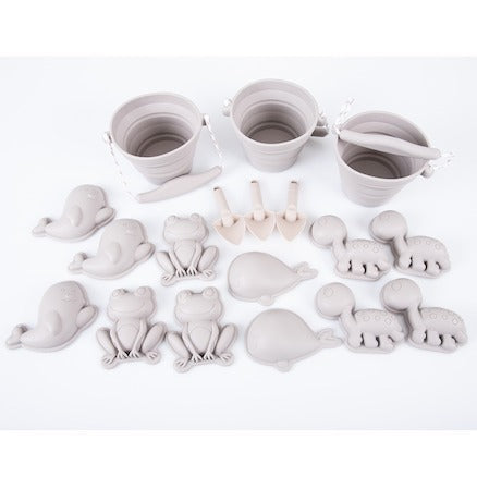 Grey Babies & Toddlers Sand & Water Collection, A collection of silicone sand, water and messy play tools perfect for exploring scooping, pouring and transporting. In a beautiful shade of grey, this set of silicone animal moulds, buckets and spades is perfect for early exploration of sand and water play. Suitable for 10 months and up. Made from durable silicone, this babies and toddlers sand and water collection is long-lasting and won't crack when dropped. The silicone is easy to clean and perfect to incor