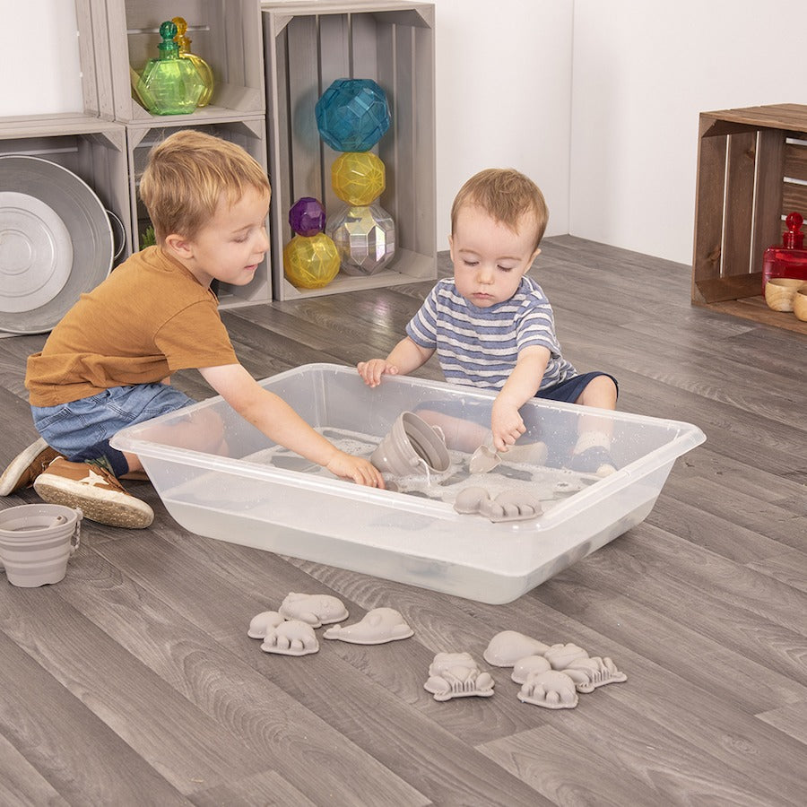 Grey Babies & Toddlers Sand & Water Collection, A collection of silicone sand, water and messy play tools perfect for exploring scooping, pouring and transporting. In a beautiful shade of grey, this set of silicone animal moulds, buckets and spades is perfect for early exploration of sand and water play. Suitable for 10 months and up. Made from durable silicone, this babies and toddlers sand and water collection is long-lasting and won't crack when dropped. The silicone is easy to clean and perfect to incor