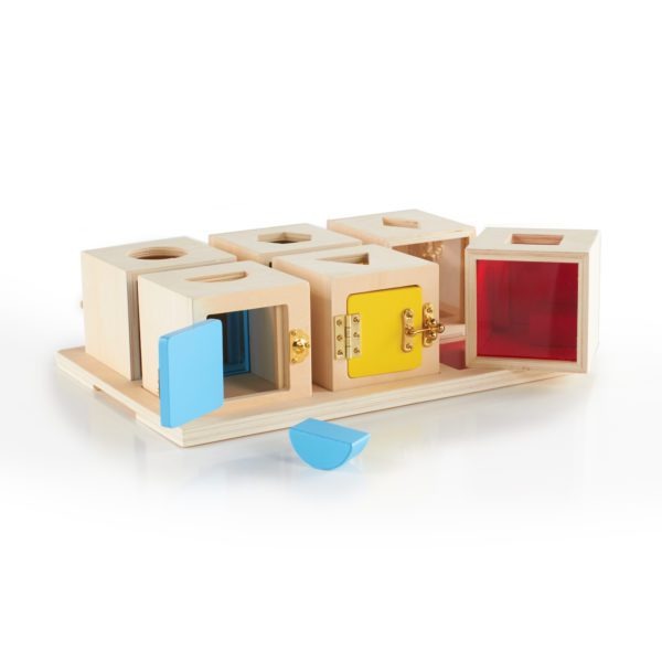 Guidecraft Peekaboo Lock Boxes, Unlock each box to explore what's behind each door! This Guidecraft Peekaboo Lock Boxes set of six wooden lock boxes is ideal for learning shape, colour, and spatial relationships. Sort the shapes into the appropriate lock boxes, view them through the transparent, coloured acrylic windows, and unlock the doors to retrieve them! Strengthens problem-solving and fine-motor skills. The chunky, solid wood shapes are easy to grasp, and all six boxes fit into a handy storage tray. G