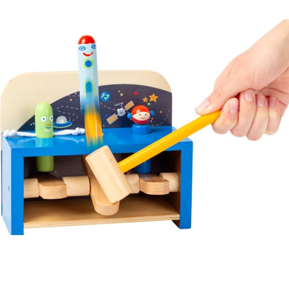 Hammering Bench Space, Children will have lots of fun with this Wooden Hammering Space Bench. It is a great way to support children’s physical development from an early age. The aim of the space themed hammering game is for children to become hammer experts and smack the wooden levers under the table. Which wooden figure will lift off first? The figures include an alien, rocket and astronaut. The use of the hammer helps improve children’s fine-motor skills and develop their hand-eye-coordination. It really 