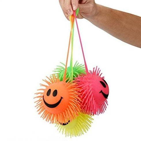 Happy Puffer Ball, Introducing the adorable and endlessly entertaining Happy Puffer Ball toy – a delightful fusion of squishiness, colors, and lights that's perfect for kids and the young at heart! Features & Benefits: Satisfyingly Squishy: Whether you need a stress-reliever or just something fun to fidget with, the Happy Puffer Ball delivers! Squeeze away and watch it bubble out in hilarious fashion, providing hours of squishy entertainment. Tactile Tentacles: Not just your regular squishy toy, the tentacl
