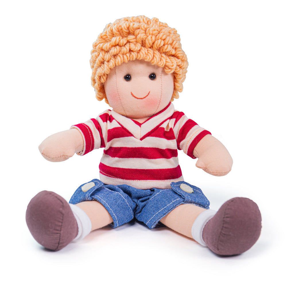 Harry Doll - Small, Introducing Harry, the perfect companion for your little one! This soft and cuddly doll is bursting with playful energy and loves nothing more than engaging in endless hours of fun and affectionate snuggles. With his mischievous charm and adorable smile, Harry is sure to capture the hearts of children and adults alike.Harry is always ready for adventure, dressed in his trendy denim shorts and a fashionable stripy top. His outfit not only reflects his playful personality but also makes hi