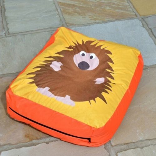 Hedgehog Outdoor and Indoor Bean Cushion, Introducing our delightful Fantastic Hedgehog Creature Outdoor Bean Cushion, where ultimate comfort meets vibrant design, infusing a touch of playful elegance into your indoor or outdoor spaces. Crafted with meticulous attention to detail in the UK, this bean cushion stands as a testimony to superior British design and quality workmanship. Key Features: Superior Materials: Our bean cushion is manufactured with premium outdoor-grade nylon and polyester fabrics that a