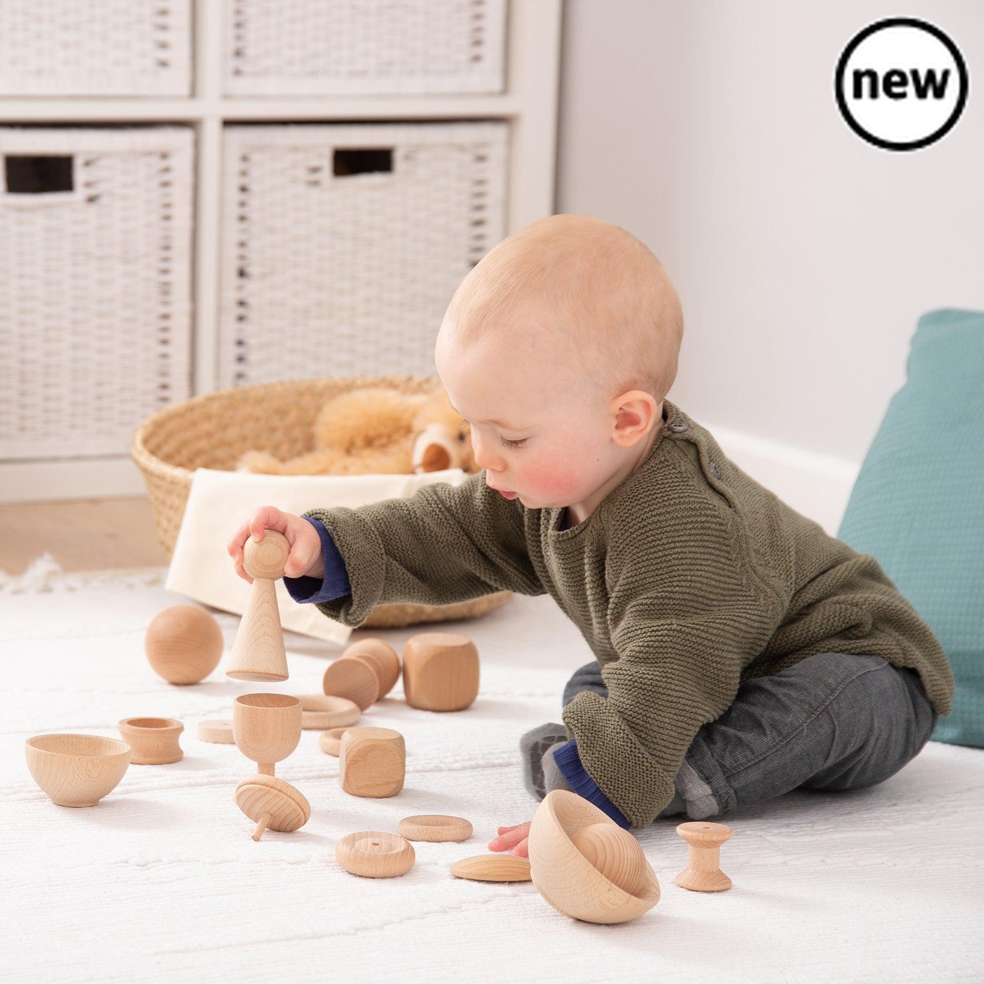 Heuristic Play Basic Set, Enable your child to discover the wonders of learning through play with our TickiT® Heuristic Play Basic Set. The Heuristic Play Basic Set contains a variety of interesting wooden objects that are not typical of the sort of toys they will be used to. These simple and curious items will spark your child's imagination and encourage them to explore ways to incorporate them into imaginative play and learn about the world around them. Quite simply, the Heuristic Play Basic Set resources