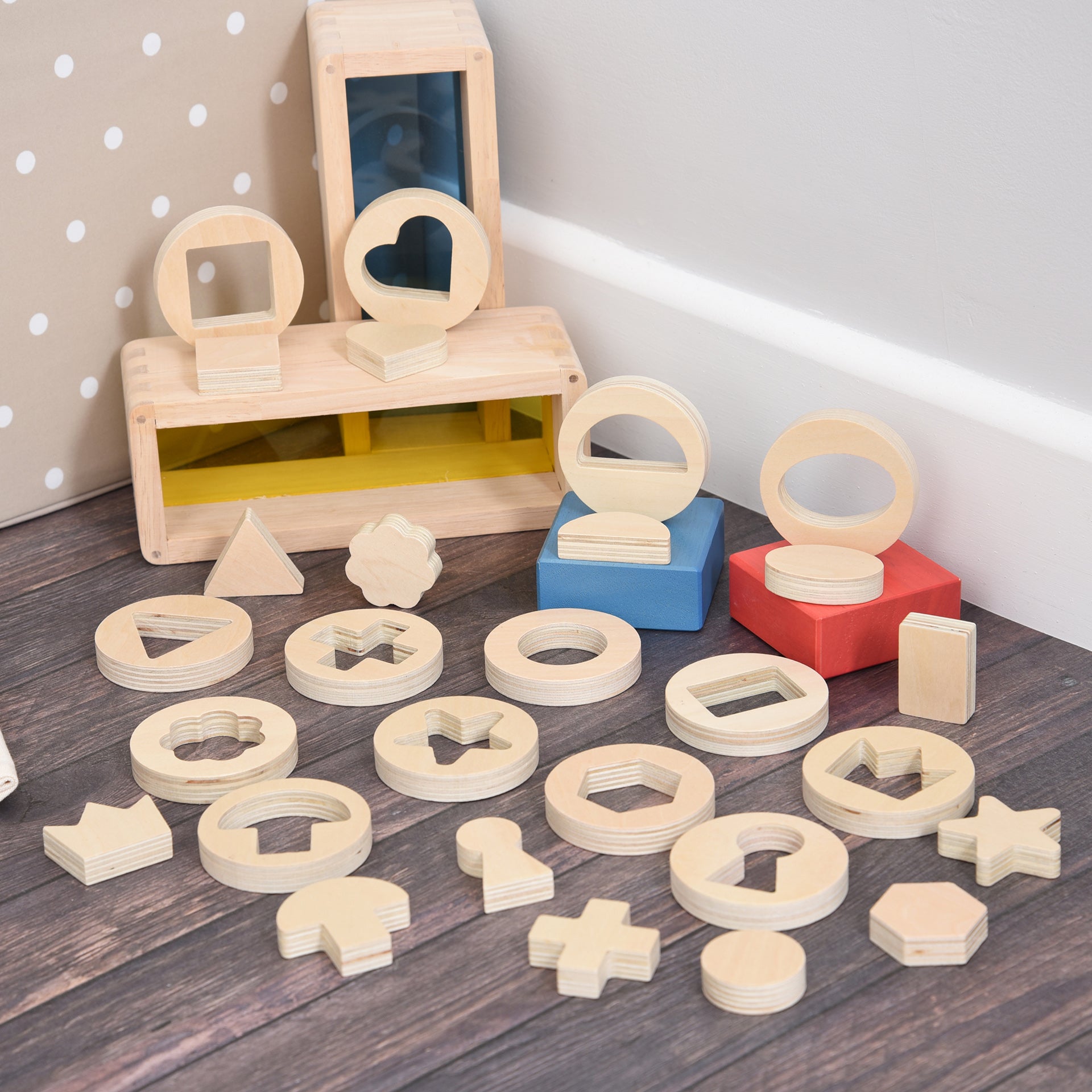 Inside Outside Wooden Shapes, Our TickiT® Inside Outside Wooden Shapes provide exciting and stimulating fun for your child to explore shape sorting and puzzle solving. A set of 14 smooth and tactile wooden discs, each with a different shape cut out and nested inside, which your child can take out for tracing, drawing around or pattern making. Each 1.2cm thick removable shape is chunky and easy for small hands to manipulate. With 7 geometric shapes (circle, oval, semicircle, triangle, square, rectangle and h