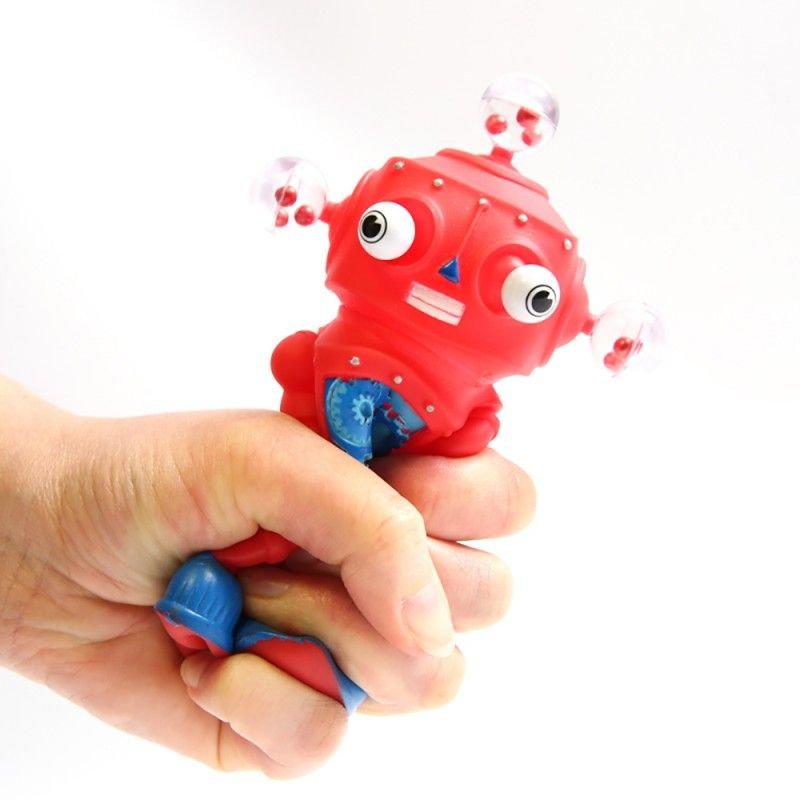 Ipop Robot, The Squishy Ipop Robot is an adorable and entertaining toy perfect for children of all ages. With just a simple squeeze, you can watch as their huge eyes and part of their head bulge out in a delightful expression. But don't worry, when you let go, they'll pop right back in again, ready for more fun!This fantastic tactile toy not only provides hours of amusement but also promotes the development of key skills. As kids squeeze and interact with the Squishy Ipop Robot, they will learn about cause 