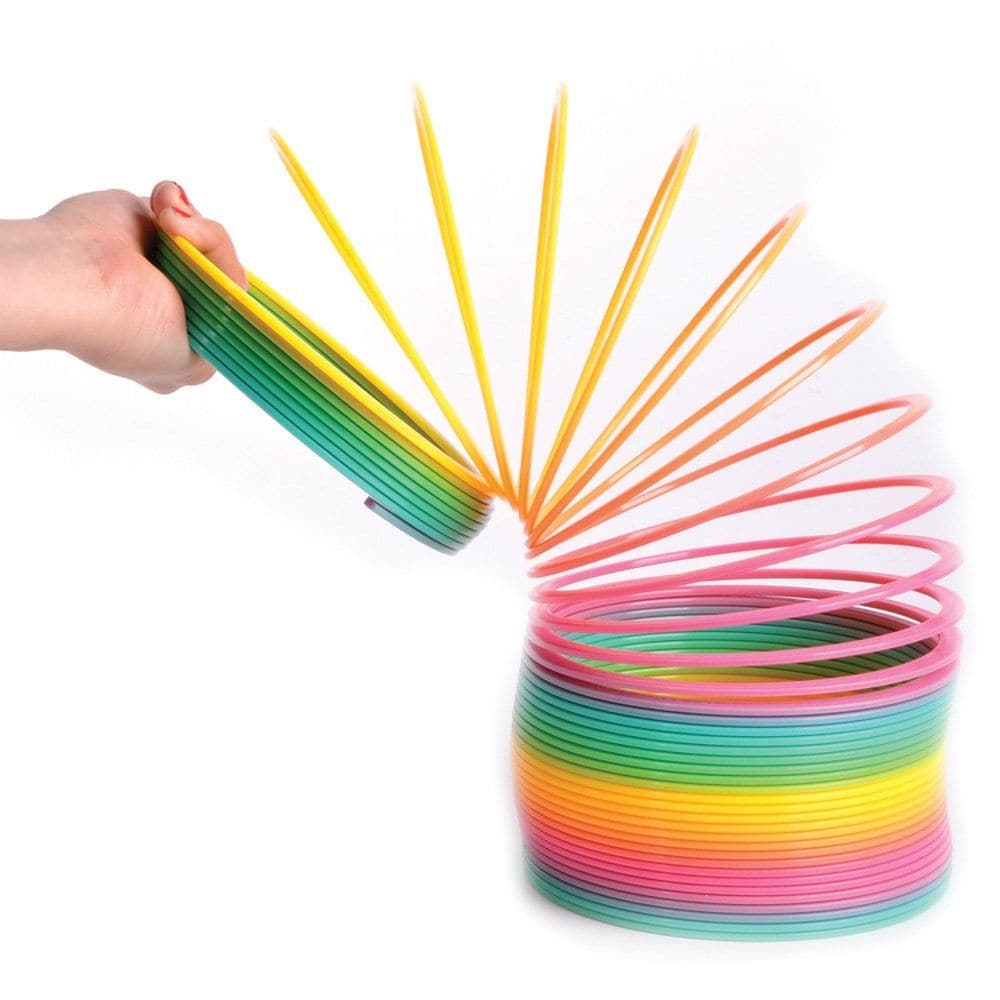 Jumbo Slinky UV Spring, The Jumbo Slinky UV Spring is a very popular tactile classic which is colourful and kids just love it. This Jumbo Slinky UV Spring is just like the classic Slinky toy, only made from kid-friendly plastic instead! Plus, as the name suggests, it’s made with a beautiful array of colour and is HUGE. Stack up the Jumbo Slinky UV Spring at the top of the stairs, tip it over, and watch it walk down stairs! Play with it between your hands or see what shapes it can stretch to! Children will h