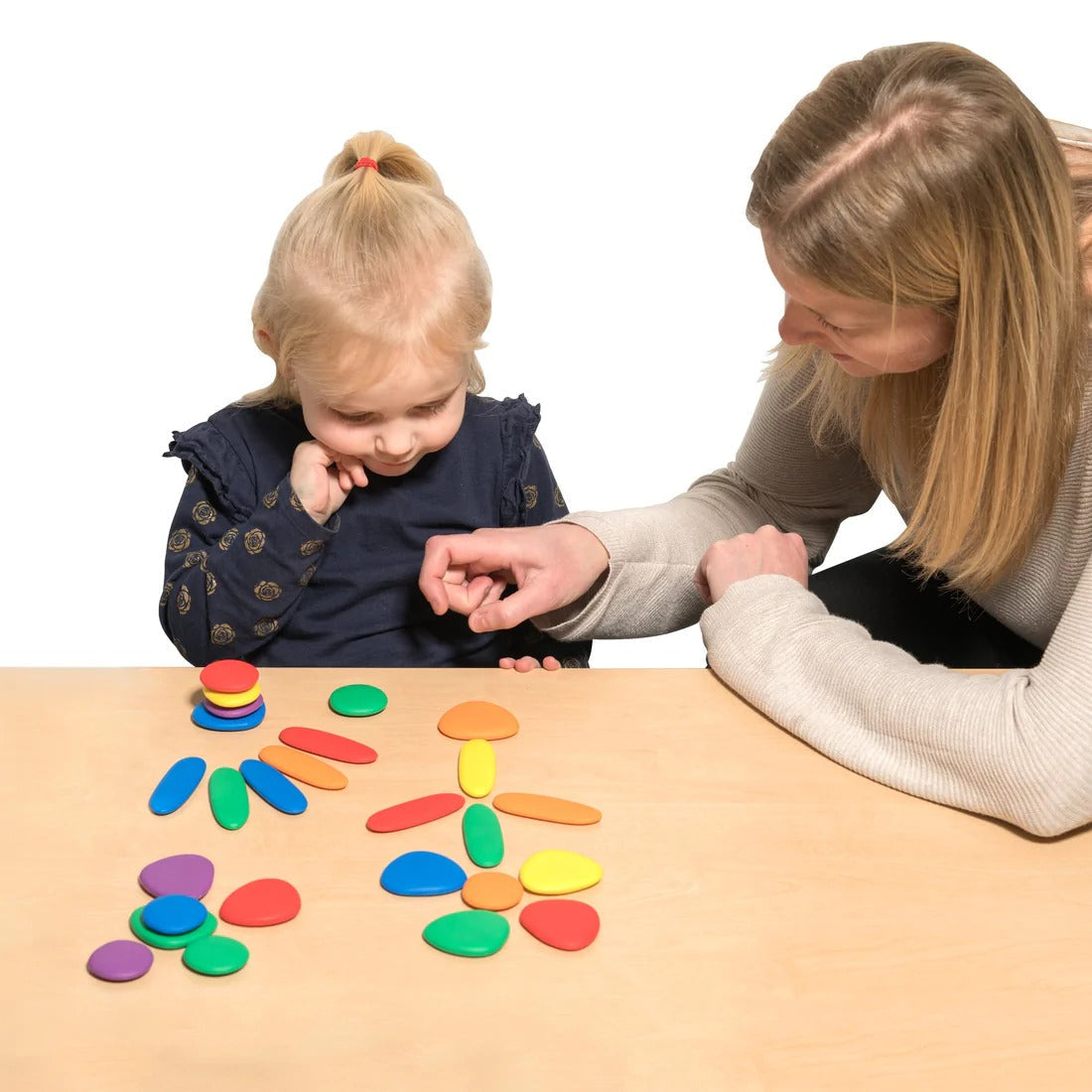 Junior Rainbow Pebbles Activity Set - Pk44, The Junior Rainbow Pebbles® Activity Set is an attractive and appealing resource! In six vibrant colours, the Junior Rainbow Pebbles are a great tool for children to learn about basic counting and sorting, number concept, measurement, balance, creation and promote fine motor skills and more.The Junior Rainbow Pebbles Activity Set supports the following areas of learning: Physical Development - motor skills Personal Development - sensory, collaborative play Underst
