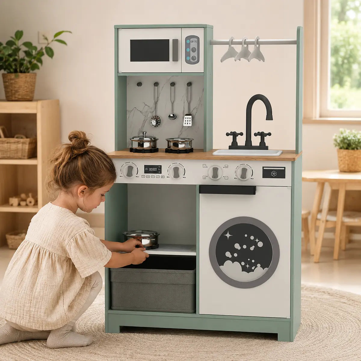 Child organising accessories in the pretend play kitchen storage