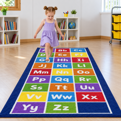 Child stepping along the Kinder Alphabet Runner Carpet