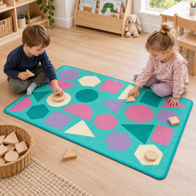 Children matching shapes on Kinder Pastel Geometric Nursery Rug