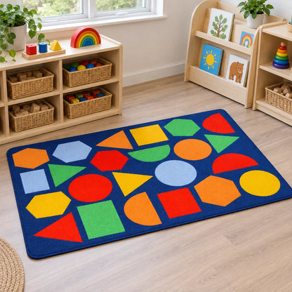 Kinder Primary Geometric Nursery Rug in classroom without children