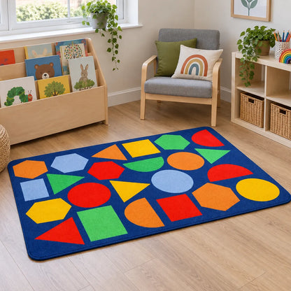 Kinder Primary Geometric Nursery Rug in reading area without children