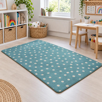 Kinder Teal Spotted Nursery Rug in creative area without children