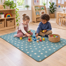 Children sorting toys on Kinder Teal Spotted Nursery Rug