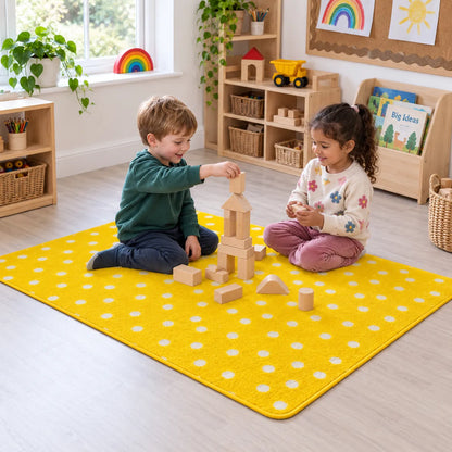 Children building on Kinder Yellow Spotted Nursery Rug