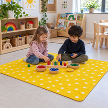 Children sorting colours on Kinder Yellow Spotted Nursery Rug
