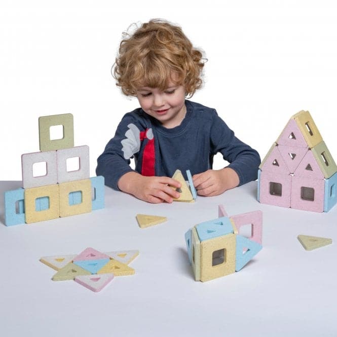 KinderMag Starter Set, Explore the magic of magnetic construction and polarity with Polydron KinderMag. Introduce children from 12 months + to their first magnetic shapes with these neutral, pastel-coloured squares and triangles. Stick together with a simple snap! The magnetic pieces can be stuck together with a simple snap to construct and create a variety of 2D patterns and 3D models. 48 chunky pieces that are easy for young hands to use. Contents: 24 triangles, 24 squares and a model guideSuper tough des