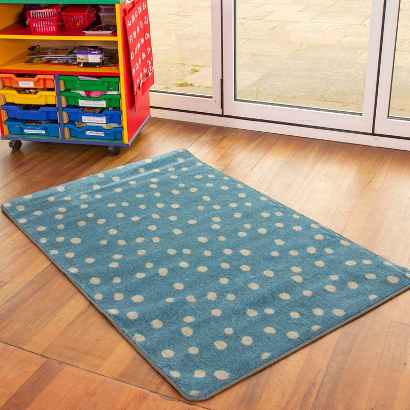 Kinder™ Teal Spotted Nursery Rug, Introducing the Kinder™ Teal Spotted Nursery Rug, a delightful addition to any nursery, playroom, or bedroom. This rug combines simplicity and fun, making it well-suited for creating a vibrant and playful atmosphere.Constructed with our Heavy Duty Dura-Pile™, this rug is made from a premium quality carpet with an extra thick pile. The soft textured tufted Nylon twist pile ensures comfort and longevity, providing a cozy surface for children to relax and play on.Perfectly des
