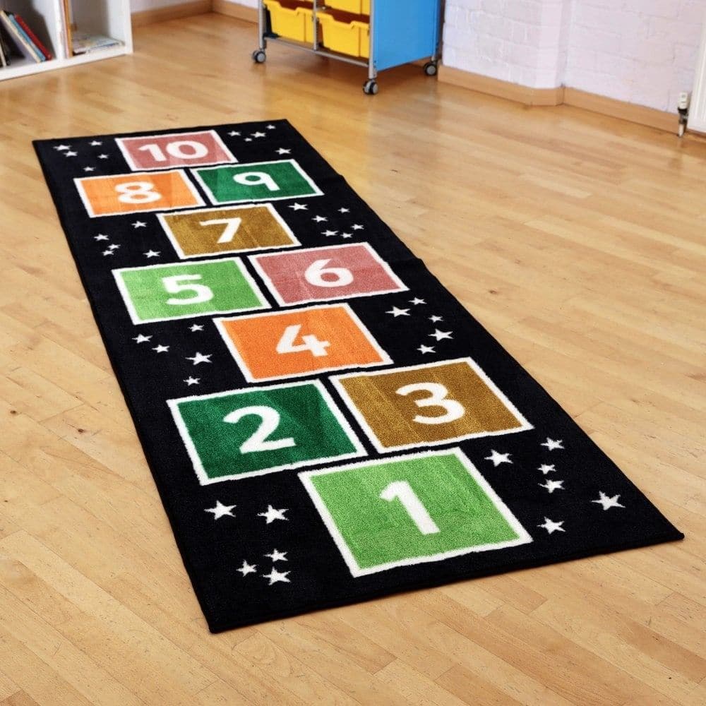 Kinder™Number Hopsotch Runner Carpet 3 X 1 Metre, Introducing the Kinder Number Hopsotch Runner Carpet, the perfect interactive tool for children to learn and have fun! Measuring 3 x 1 metre, this carpet features the numbers 1 to 10, providing a playful way for kids to practice their counting skills.Crafted from heavy-duty dura-Pile™, this premium quality carpet is built to withstand the test of time. With its extra thick pile, it not only provides a comfortable surface for little ones to hop and play on bu