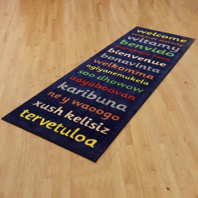 Kinder™Welcome Runner Carpet 3 X 1 Metre, The Kinder™Welcome Runner Carpet is the perfect addition to any Early Years Foundation Stage (EYFS) setting. Measuring 3 x 1 metre, it is not only visually appealing but also highly functional.Featuring the word "Welcome" in a variety of different languages, this carpet promotes inclusivity and diversity in your learning environment. Children will feel welcomed and valued as they explore and play on this vibrant and educational carpet.Constructed with a substantial 