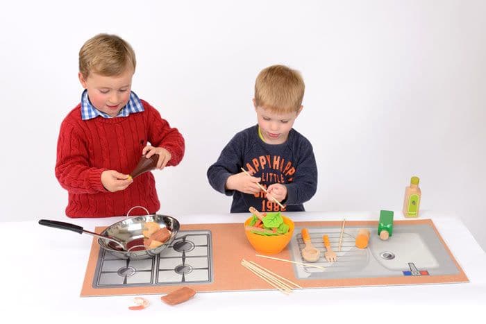 Kitchen Play Top, The Kitchen Play Top set includes a kitchen stove top with knobs that turn and click, a sink with working faucet, and plenty of storage space for kitchen utensils and pretend food. It comes with realistic cooking images to enhance the imaginative play experience. This Kitchen Play Top is perfect for encouraging children to explore their social and emotional development through play, as they mimic the roles and actions of real life chefs and caretakers. It promotes creativity, problem solvi