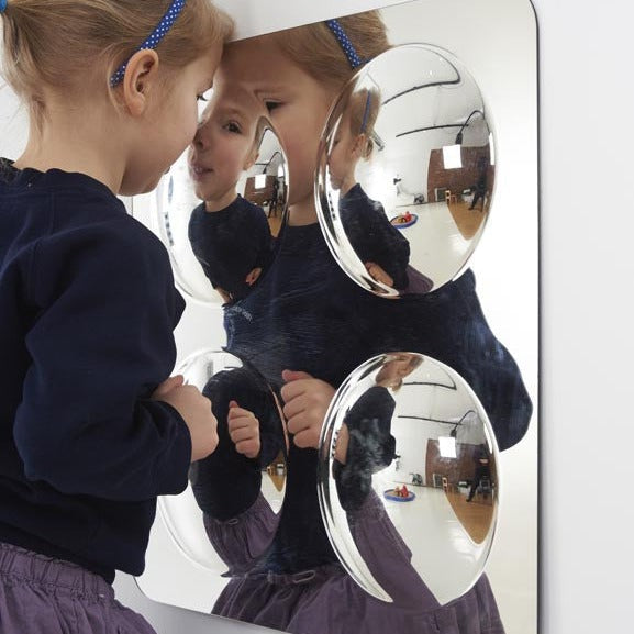 Large 4-Domed Acrylic Mirror Panel, The Large 4-Domed Acrylic Mirror Panel is made from scratch resistant acrylic these 4 Domed Mirror panels are safe and ideal for any classroom or nursery setting. Children are drawn to the Large 4 Domed Acrylic Mirror panels for the observation of themselves and objects. The convex mirror domes provide a distorted, fun and interesting view of the world for children to explore. The Large 4 Domed Acrylic Mirror can be sited inside or outside and come with sticky pads and co