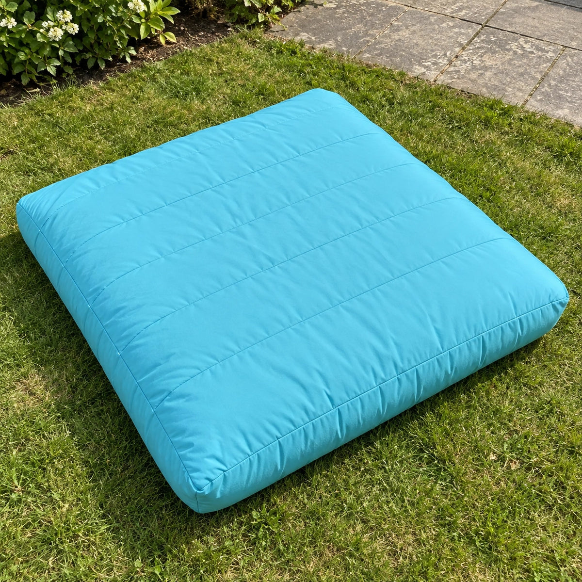 Aqua Large Quilted Cushion — garden overhead view