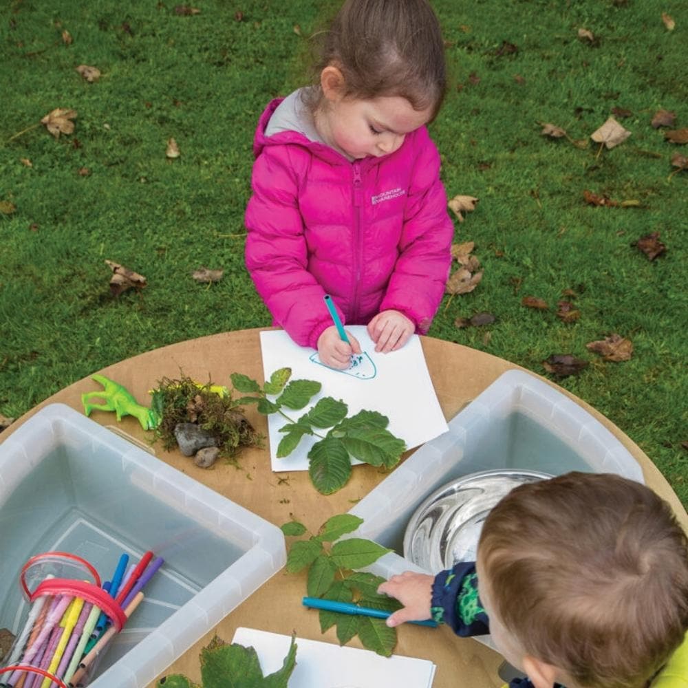 Leave Me Outdoors 460mm High Table with Inset Trays, Give little ones their own outdoor play area with the Leave Me Outdoors - Table with Tray Inserts. The new 'Leave Me Outdoors' range is the best way to take the classroom outside. Every product in the range can be used and left outside no matter the weather. Made from 'Outdoor Duraply' the units are all weather proof and fungal resistant while still being highly durable. Finished with stainless steel fixings which are corrosion resistant the units are all