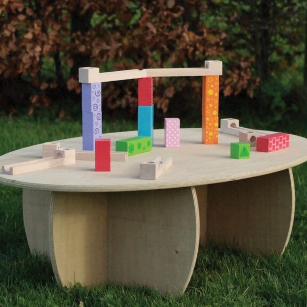 Leave Me Outdoors Outdoor Toddler Table, This oval Outdoor Toddler Table is manufactured using a new and innovative 15mm covered outdoor MDF, with bull nosed edges. The Outdoor Toddler Table makes a beautiful long last unique feature point in your garden or early years setting,this is a hard wearing practical solution providing the perfect play table outdoors. Weather proof and fungal resistant Extremely durable, corrosion resistant, stainless, steel fixings and castors Virtually maintenance free. As with i