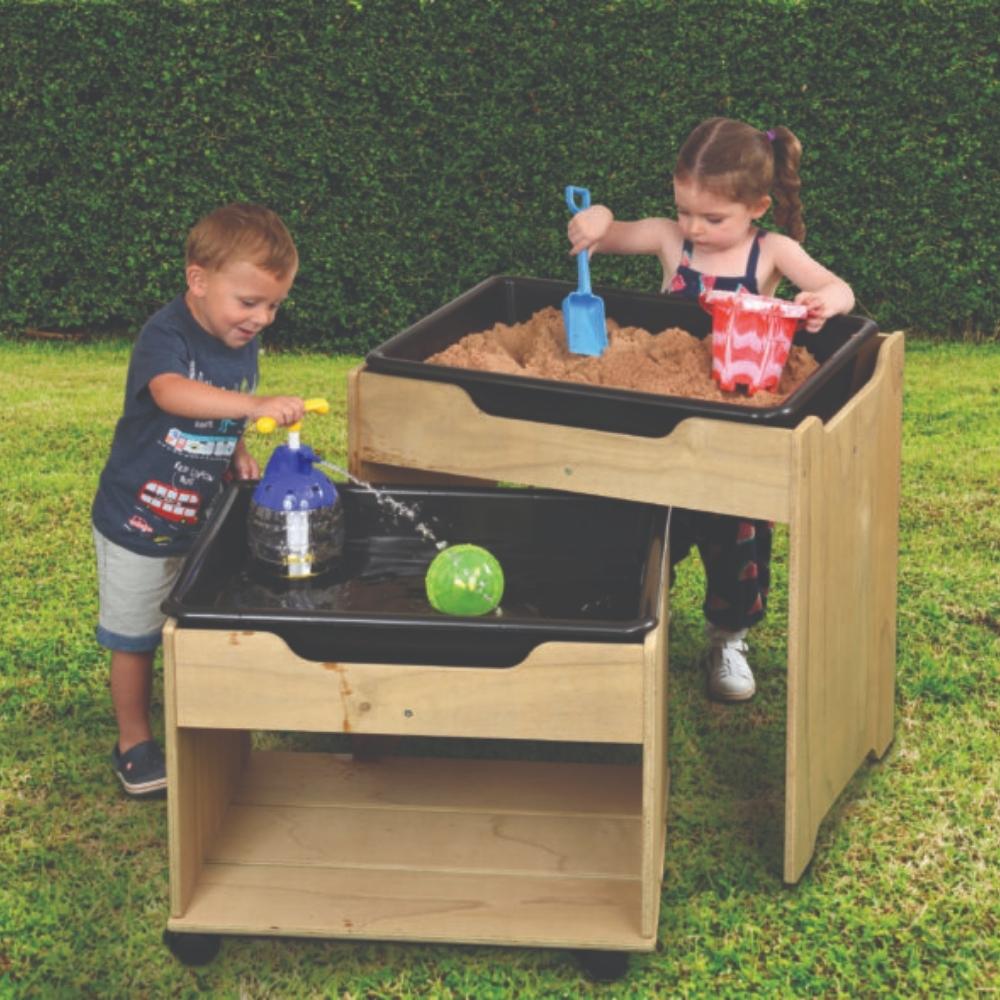 Leave Me Outdoors Sand And Water Duo, This space saving Leave Me Outdoors Sand And Water Duo is perfect for early years’ settings. Transform your early years' setting with the versatile and innovative Leave Me Outdoors Sand And Water Duo! Designed with practicality and durability in mind, this duo table set is perfect for hands-on learning and sensory play. Space-Saving Design Say goodbye to clutter! The Leave Me Outdoors Sand And Water Duo features a brilliant nesting design. When not in use, the smaller t