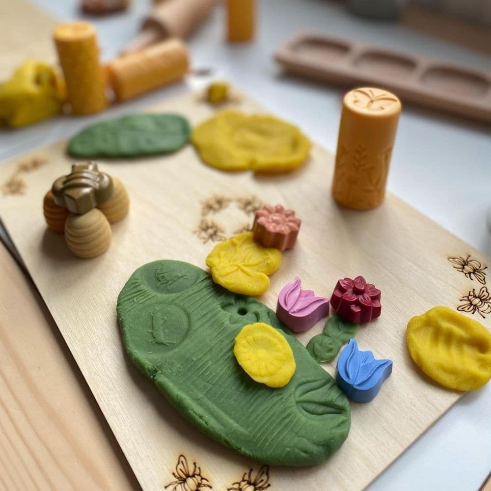 Let's Roll Garden Bugs pk 6, These Let's Roll Garden Bugs rollers offer an imaginative way for children to explore the natural world through creative play. Roll into play dough or clay and stamp with the bugs to create hands-on habitats! Count the bees on the honeycomb, match the ladybirds to flowers and tell stories of what is happening close by when you look carefully. Children can experiment using different amounts of pressure and rolling in different ways, honing their fine motor skills as they create t