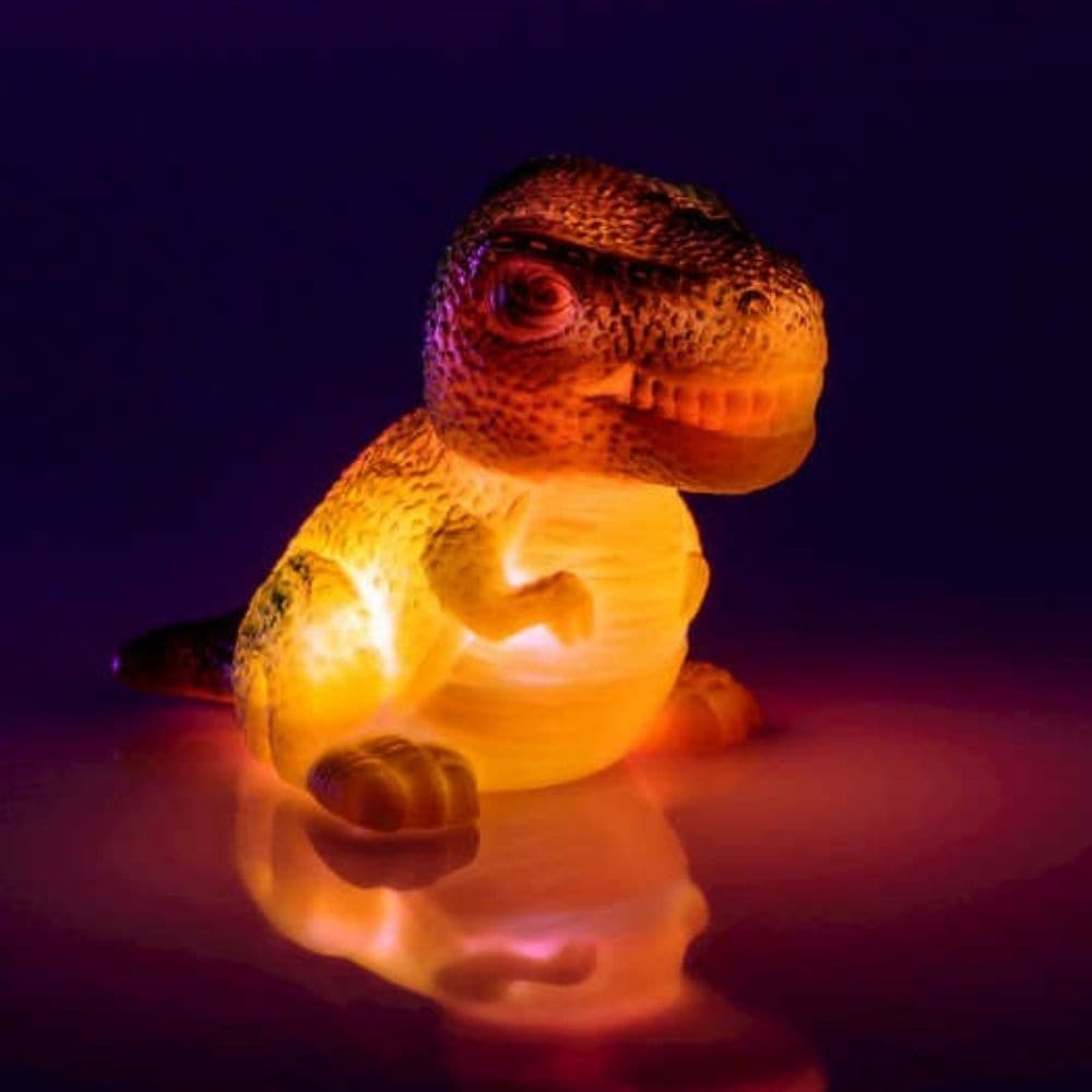 Light Up Dinosaur Bath Toy, Make bath time an exciting adventure with the Light Up Dinosaur Bath Toy! This incredible water activated bath light is shaped like a fearsome dinosaur and will instantly light up and flash as soon as it touches the water. Watch as your little one's face lights up with wonder and excitement!This bath toy is perfect for adding a touch of fun and excitement to your child's bath time routine. The light up feature will keep them entertained as the dinosaur bobs and floats around the 
