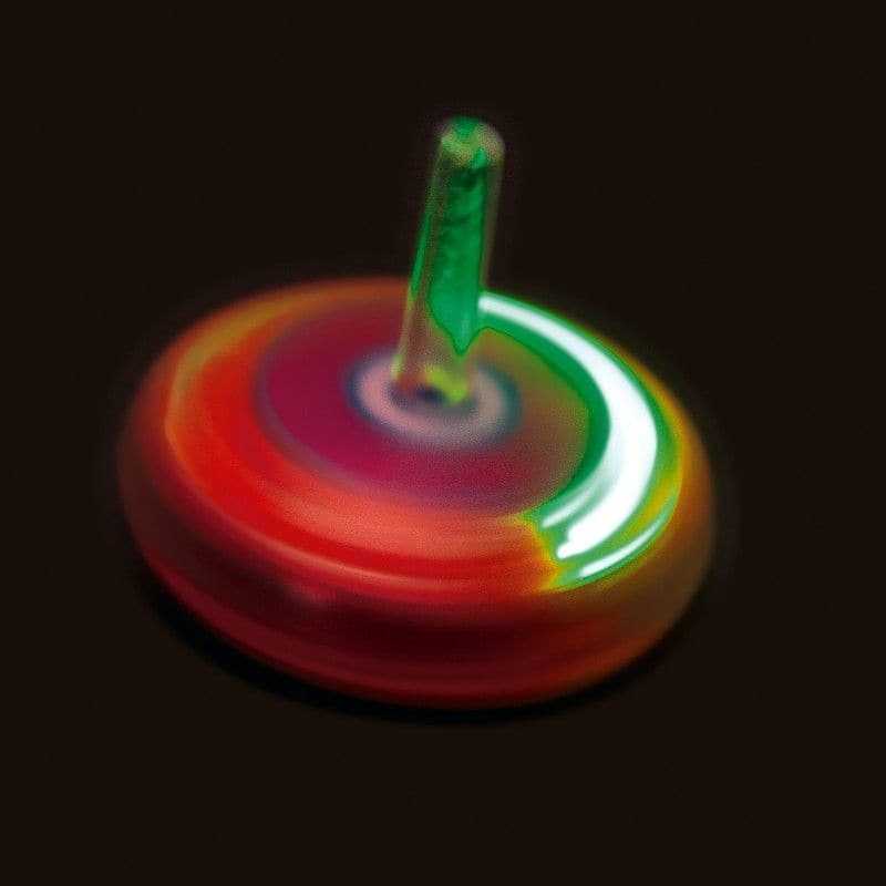 Light Up Spinning Top, Plastic spinning top that lights up as it spins. Twist the light up top and drop it on a flat surface to make it spin. As it rotates the LEDs around the edge light up and flash in a variety of patterns and colours that make quite a mesmerising effect.The Light up spinning top is a perfect toy for kids and adults alike who love to play and experiment with light. Made of durable plastic, this spinning top is designed to spin smoothly and steadily on almost any flat surface. The moment y