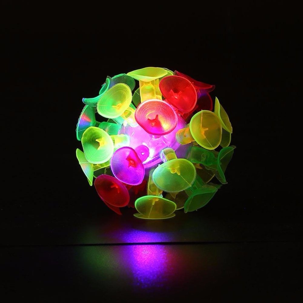 Light Up Sucker Ball, Toss this silly suction cup ball against a wall to make it smack! Watch the the lights flash for a spectacular show that really sticks with you! This Light Up Sucker Ball will keeps kids delightfully entertained. Expect plenty of giggles from the "popping" of each suction cup as it rolls down the wall.Soft and tactile, The Light Up Sucker Ball is ideal for all kinds of play engaging kids in sensory activity encouraging touch and providing visual stimulation. Make it bounce and stick it