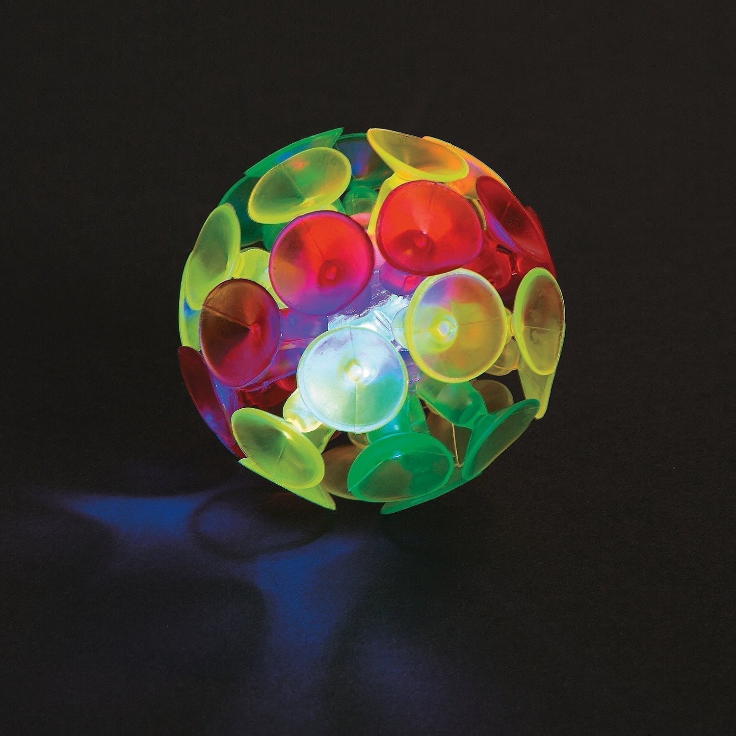 Light Up Sucker Ball, Toss this silly suction cup ball against a wall to make it smack! Watch the the lights flash for a spectacular show that really sticks with you! This Light Up Sucker Ball will keeps kids delightfully entertained. Expect plenty of giggles from the "popping" of each suction cup as it rolls down the wall.Soft and tactile, The Light Up Sucker Ball is ideal for all kinds of play engaging kids in sensory activity encouraging touch and providing visual stimulation. Make it bounce and stick it