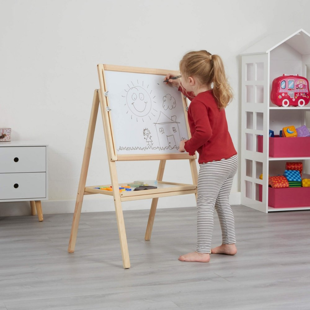 Little Acorns Height Adjustable Double Sided Easel, Unleash the inner artist, with this reversible double-sided easel with a chalkboard one side and a magnetic dry wipe board the other. Children can draw, write and scribble! Children using this easel will get multiple benefits such as developing fine motor skills through holding pens or chalk, gross motor skills through movements in the upper arms and cognitive skills such as learning the alphabet with our set of magnetic letters. The double-sided easel wil