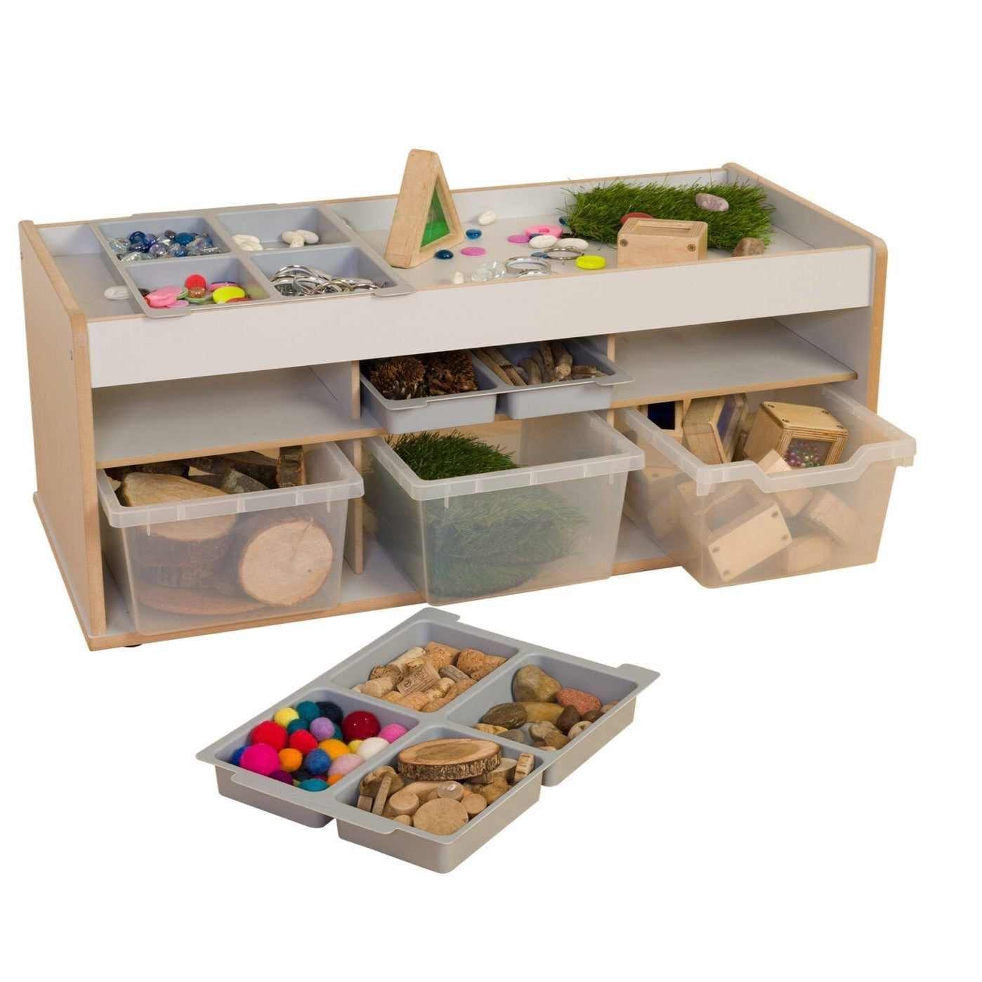 Loose Parts Play & Store Table, The Loose Parts Play & Store Table is a unique storage solution and play surface combination which offers maximum versatility for sorting and organising maths, loose parts, small world and transient art resources. Loose Parts Play & Store Table 15mm Covered MDF – ISO 22196 certified antibacterial. Supplied with 3 storage trays with compartments. Storage underneath for trays when not in use. Supplied in flat pack form with easy to follow assembly instructions. Dimensions 898 ×