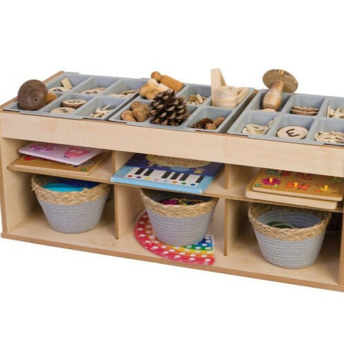 Loose Parts Play & Store Table, The Loose Parts Play & Store Table is a unique storage solution and play surface combination which offers maximum versatility for sorting and organising maths, loose parts, small world and transient art resources. Loose Parts Play & Store Table 15mm Covered MDF – ISO 22196 certified antibacterial. Supplied with 3 storage trays with compartments. Storage underneath for trays when not in use. Supplied in flat pack form with easy to follow assembly instructions. Dimensions 898 ×
