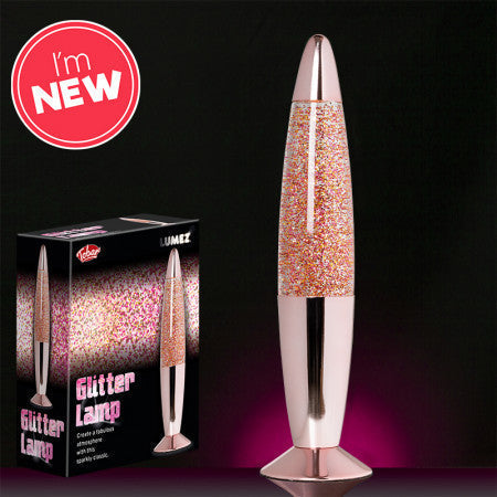 Lumez Glitter Lamp - Rose Gold, Rose gold liquid lamp with retro inspired styling. When the glitter lamp is plugged in, the light bulb heats up the glitter-filled liquid, causing it to swirl around the cylinder. What’s more, the liquid is crystal clear, allowing for the pink and gold glitter inside to sparkle. This is a classic lamp style that’s been popular for decades, and continues to be today. Colourful glitter lamp Glitter filled liquid swirls inside Retro effect Rose gold design Mains powered (UK plug