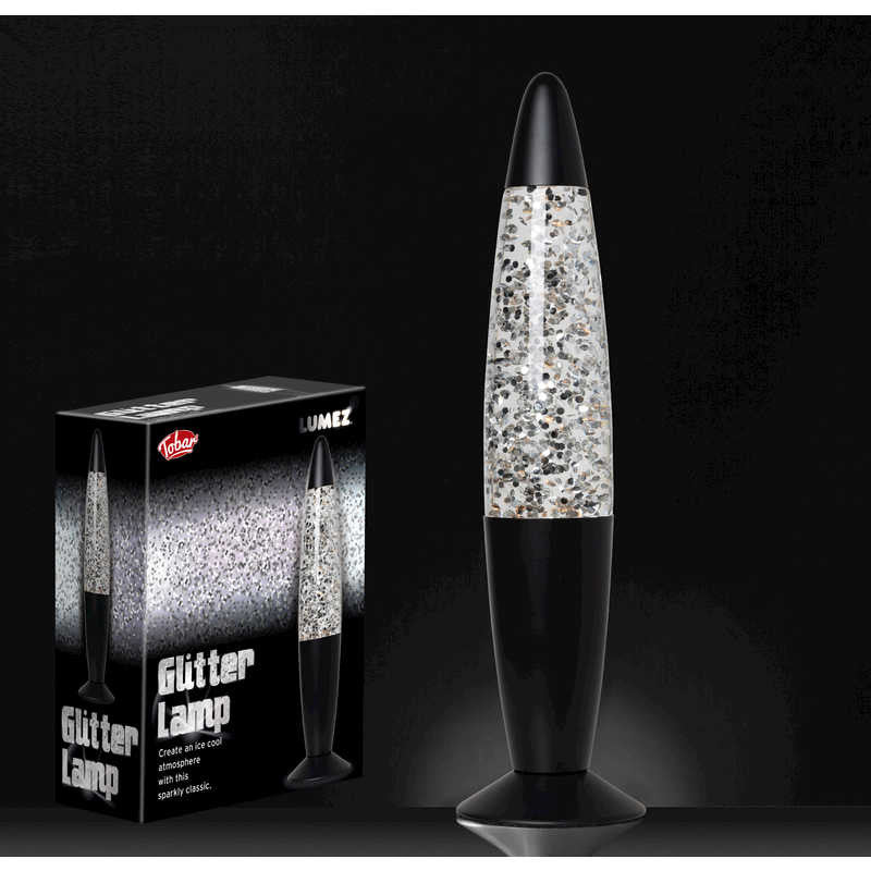 Lumez Glitter Lamp - Silver, Liquid lamp with retro inspired styling. When the glitter lamp is plugged in, the light bulb heats up the glitter-filled liquid, causing it to swirl around the cylinder. What’s more, the liquid is crystal clear, allowing for the silver glitter inside to sparkle and shine. This is a classic lamp style that’s been popular for decades, and continues to be today. Colourful glitter lamp Glitter filled liquid swirls inside Retro effect Black design Mains powered (UK plug) Approx. 33cm