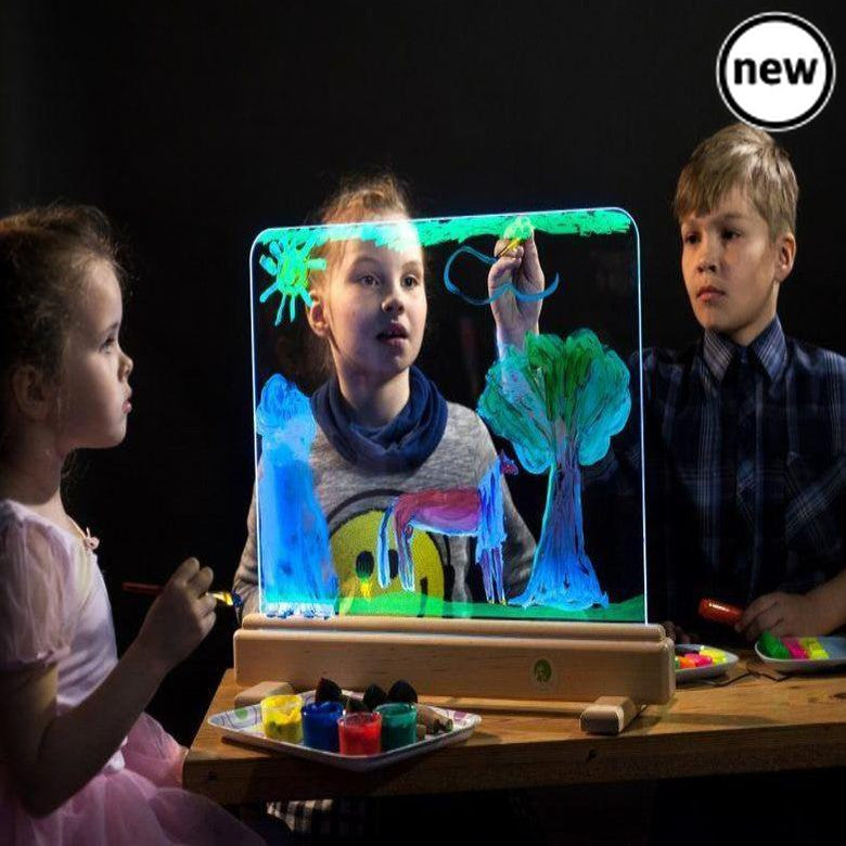 Magic Light Easel, The Magic Light Easel has magic tempered glowing glass on which you can paint on. Control unit of the device allows you to select from the range of 16 colours of the base lighting and every time create a new masterpiece. You can create a different impression of your piece of art only by changing the lighting. So, you should not immediately wipe out the landscapes you have created – change the colour and enjoy undiscovered ornaments of the drawing. Unlike a paper drawing that cannot be era