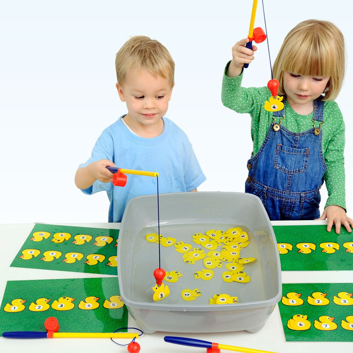 Magnetic Duck Fishing, Introducing our fun and educational Magnetic Number Fishing Game! This game is perfect for both indoor and outdoor play as it can be used in a water tray or on a tabletop. It comes with 4 waterproof double-sided play boards that provide 2 levels of play suitable for up to 4 players.The Magnetic Fishing Rods are designed to easily pick up the ducks from the water or sand as they have ferritic stainless steel parts that won't rust. Each duck has a number printed on both sides, ranging f