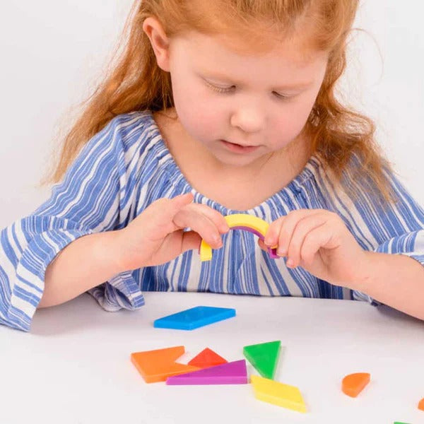 Magnetic Irregular Shapes pk 104, This set of Magnetic Irregular Shapes is a versatile and educational tool for young children. With 104 magnetic pieces in vibrant colors, children can engage in hands-on exploration of different shapes and how they fit together.This set is perfect for a variety of educational activities and 2D building play on magnetic boards and other metal surfaces. Children can easily manipulate the pieces and experiment with creating their own designs and patterns. They can explore conc