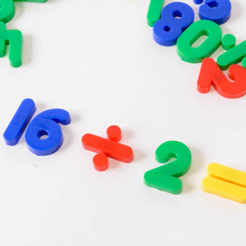 Magnetic Numbers and Symbols, These Magnetic Numbers and Symbols are a vibrant and engaging tool for teaching children in a classroom setting. The set includes a variety of brightly coloured numbers and symbols that can be used to assist in teaching basic mathematics. The magnetic feature allows for easy and secure placement on any magnetic surface, such as a whiteboard or fridge. The Magnetic Numbers and Symbols come in a convenient storage tub, ensuring they are kept safe and organised when not in use. Th