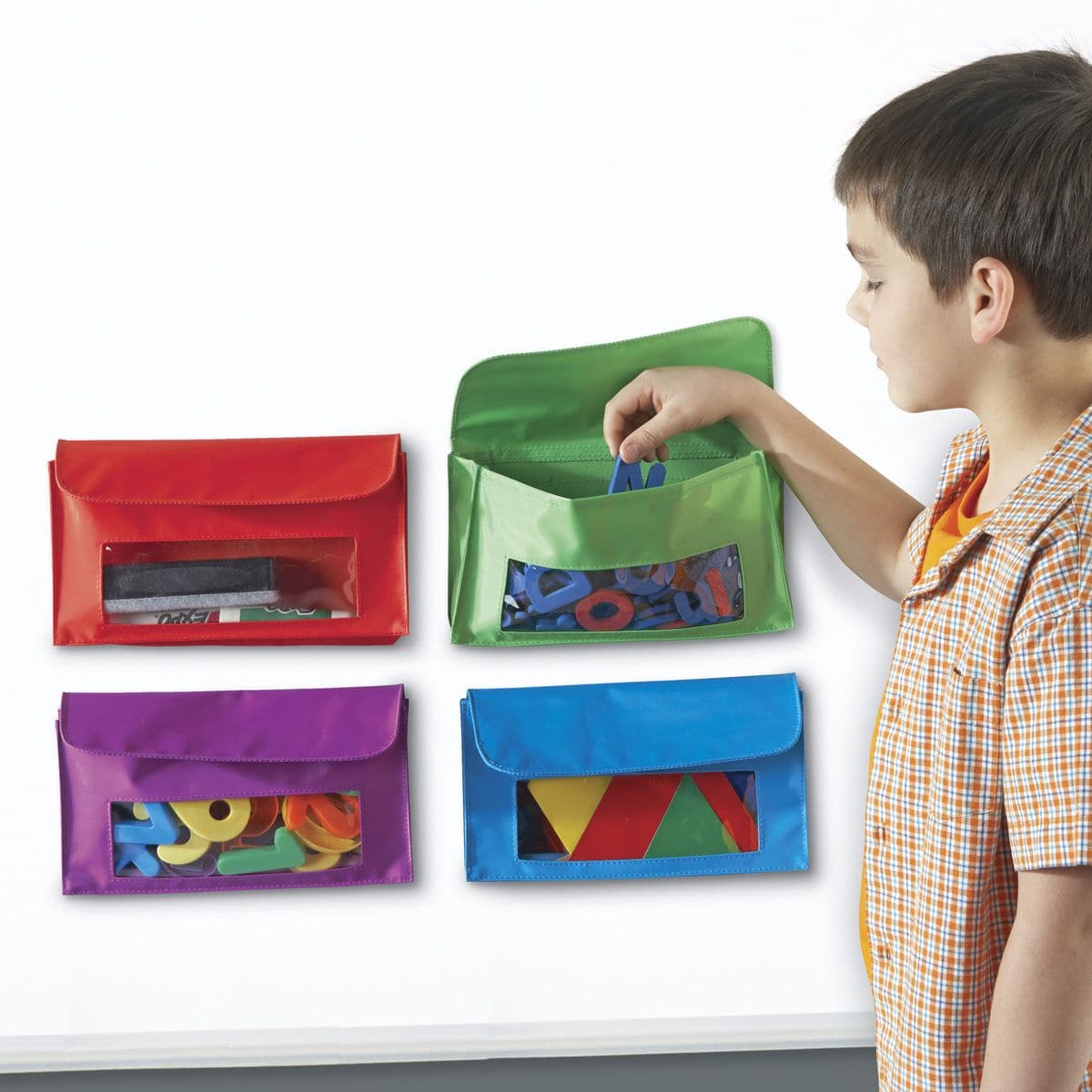 Magnetic Storage Pockets Pack of 4, Introducing our handy Magnetic Storage Pockets, the ultimate solution for instant organization in any classroom or workspace. These sturdy and vibrant pockets are specifically designed to assist with classroom organization, making your life easier and more efficient. With these Magnetic Storage Pockets, you can store all your whiteboard accessories within easy reach, eliminating the hassle of searching for markers, erasers, or other essential items. Each pocket is built t
