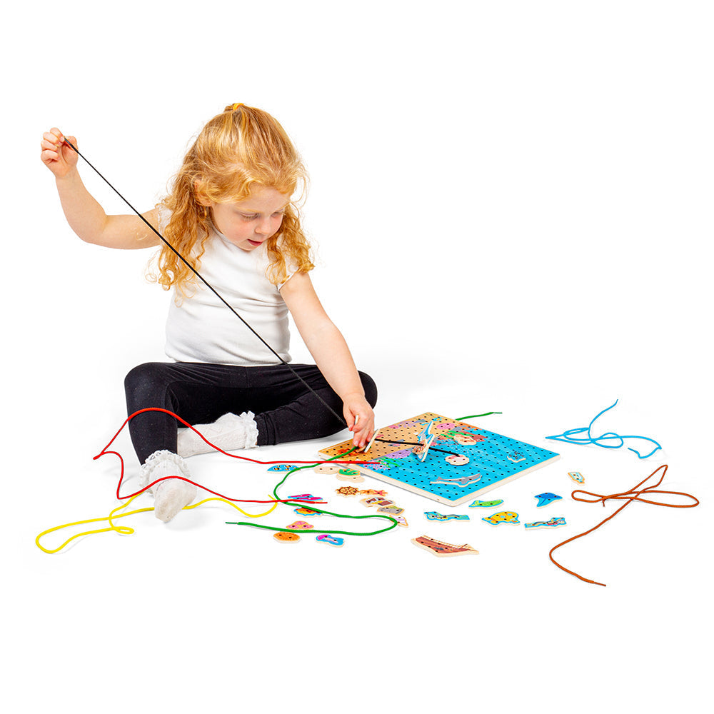 Marine Lace-A-Shape, Ready for an under the sea adventure? Thread the laces through the marine shapes and onto the baseboard to create an exciting sea scene. Wooden threading toys are a fun way to develop kids’ hand-eye coordination, fine motor and sequencing skills. Our Marine Lacing Game For Toddlers features 30 different marine-inspired shapes and six different coloured laces. Youngsters need to simply thread the laces through the shapes and onto the baseboard to create a picture. Made from high quality,